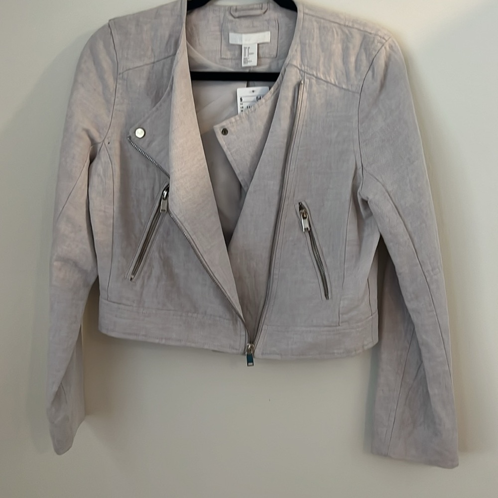 Women’s zip up. H & M size 8 US, white